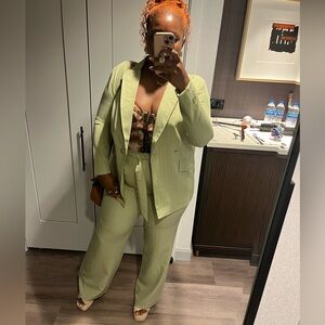 Green pinstriped pants suit